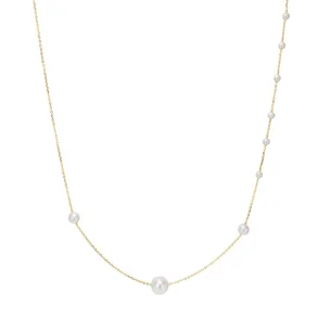 Halskde med perler i forlb